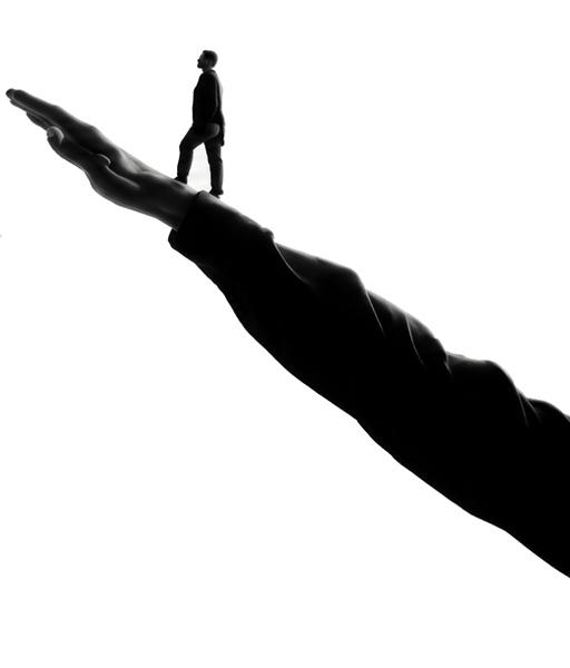 A giant open hand with a small suited figure standing in the palm
